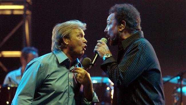 Singers John Farnham &amp; Tom Jones singing during concert in Brisbane.