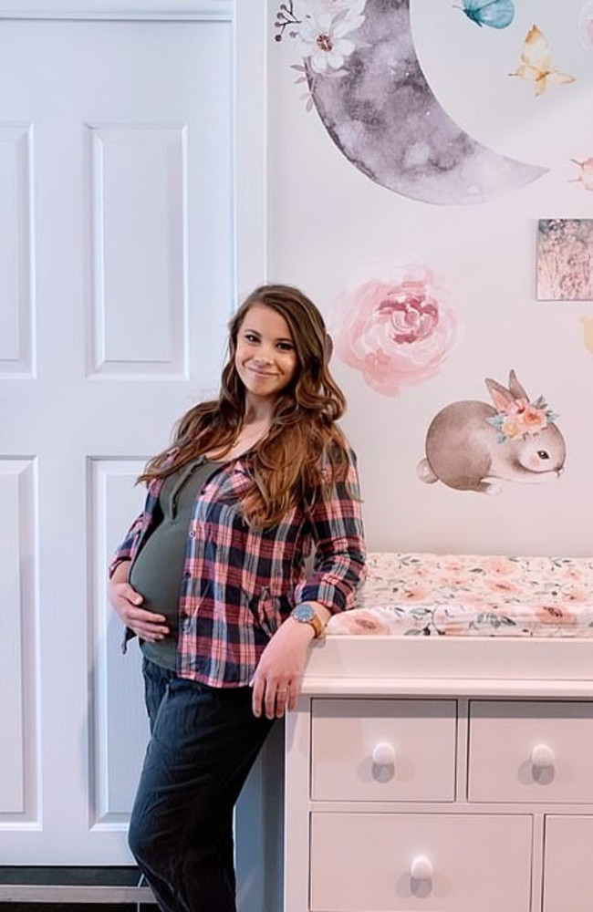 So cute! Pregnant Bindi Irwin poses in front of the delicate illustrations in her daughter's nursery. Picture: Instagram