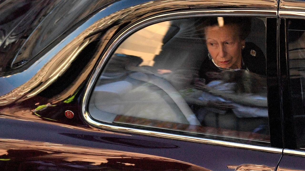 Princess Anne, Princess Royal looks from the window of a car following the hearse carrying the coffin of Queen Elizabeth II. (Photo by Louisa Gouliamaki - WPA Pool/Getty Images)