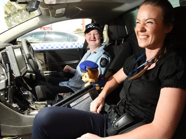 Amieleigh Cooper, 18, has several intellectual disabilities, however she has always had a fascination with police and dreamt of becoming a policewoman. Over the past year, Broadmeadows Police Station has been facilitating visits with Amieleigh, chatting with her about what they do, giving her tours of the station and even presenting her with her own uniform. Sergeant Fiona Parvin and Constable Erin Simper have both been quite active in helping Amieleigh. Amieleigh with Const Erin Simper. Amieleigh had no difficulty in finding the siren in one of the divisional vans. Picture: Lawrence Pinder