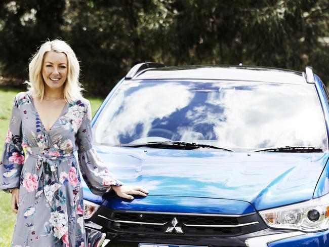 Photo of nutritionist Lola Berry and her Mitsubishi ASX