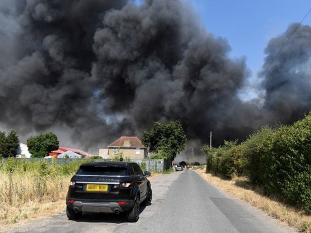 Fire engulfing a village to the east of London. Picture: Reuters.