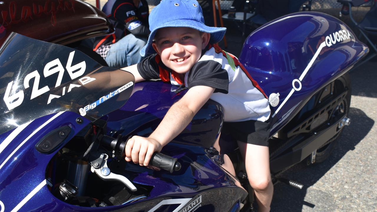 Max Dolphin, 7, of Airlie Beach, jumps on this bike at Big Boys Toys Expo. Photo: Janessa Ekert and Tara Miko