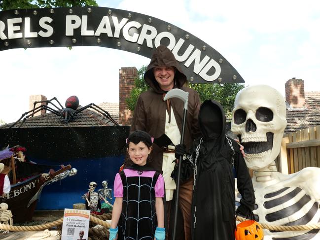 Ivy, Marcus and Sebastian trick-or-treating at the Scoundrels Playground in North Balwyn.