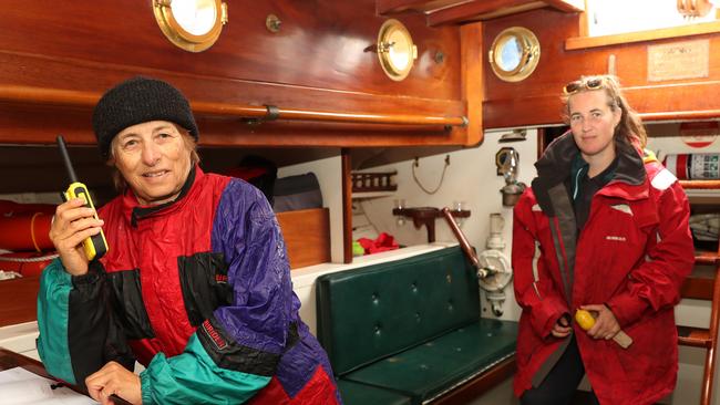 Historic yacht Kathleen Gillett preparing to return to racing at the Balmain Regatta this Sunday. Maria Tzannes and Hannah Hansen getting the boat ready to go out sailing. Picture Rohan Kelly.