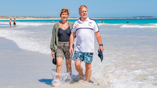 Perth residents Olga and Keith Holmes at Cable Beach in Western Australia. They were refused an exemption to leave the country by the Department of Home Affairs. Picture: Abby Murray