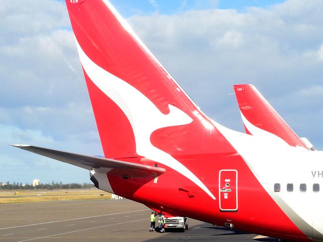 Qantas planes are seen on the tarmac at Adelaide Airport in Adelaide, Wednesday, May 8, 2019. (AAP Image/Bianca De Marchi) NO ARCHIVING