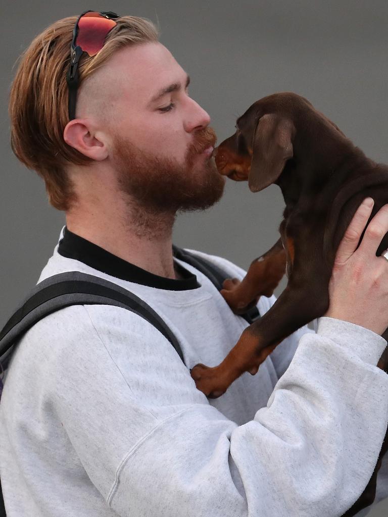 Cam and his puppy. (Photo by Paul Kane/Getty Images)