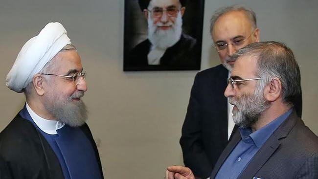 Iran's President Hassan Rouhani (L) at the award ceremony and badge of merit for Iranian nuclear scientist Mohsen Fakhrizadeh (R) in Tehran, 2020. Picture; AFP.