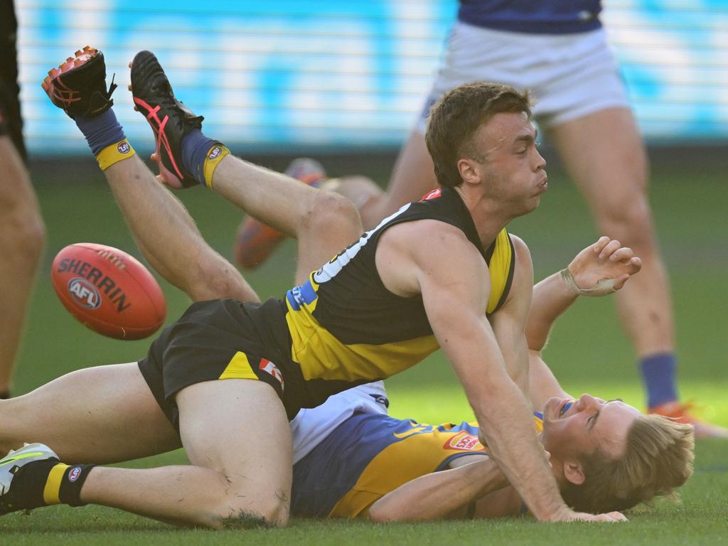 Tom Gross is run down by Tiger Tom Brown in the dying moments. Picture: Quinn Rooney/Getty Images