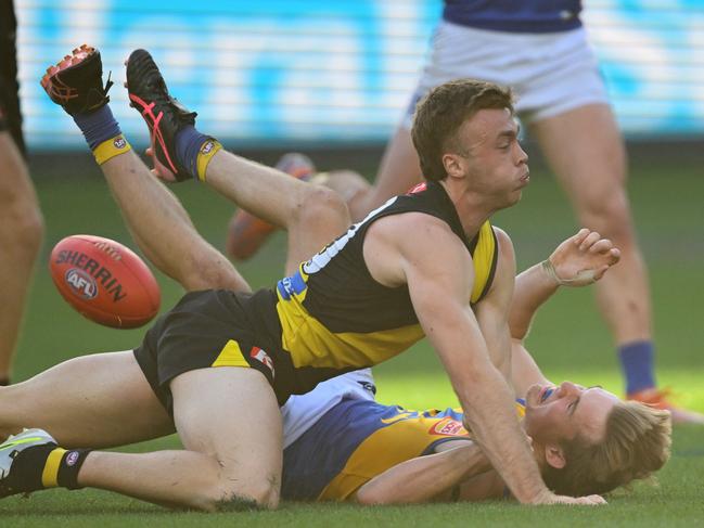 Tom Gross is run down by Tiger Tom Brown in the dying moments. Picture: Quinn Rooney/Getty Images