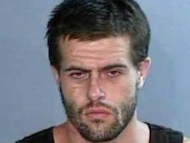 A mug shot of Coffs Harbour man Reiley Jay Amos published on social media by NSW Police Force in 2019.