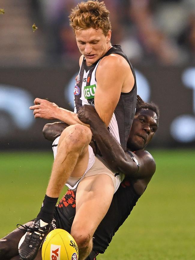 McDonald-Tipungwuti catches Hoskin-Elliott. Picture: Getty Images