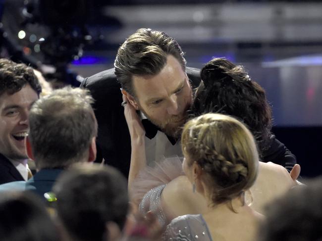 Ewan McGregor kisses Mary Elizabeth Winstead before accepting the award for best actor in a movie made for TV or limited series for “Fargo” at the 23rd annual Critics’ Choice Awards. Picture: AP