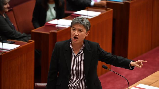 Shadow Minister for Foreign Affairs Penny Wong reacts after Minister for Finance Mathias Cormann successfully suspended standing orders in the Senate, and has won a vote to overturn a decision the Senate made on Thursday that the debate on the Sex Discrimination bill (to protect LGBT students) end, at Parliament House in Canberra, Monday, December 3, 2018. (AAP Image/Mick Tsikas) NO ARCHIVING