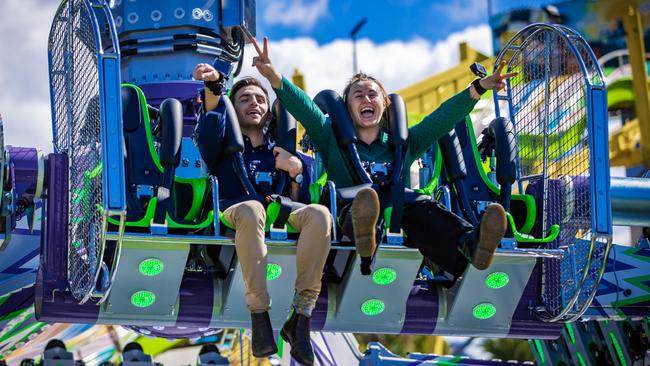 New ride at the Ekka. Courier Mail journalists Andreas Nicola and Taylah Fellows tries out The Joker ride which is a new ride to feature at this years Ekka. Picture: Nigel Hallett