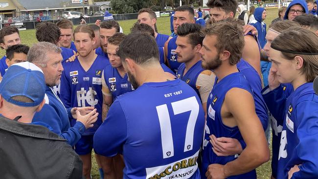 Hastings coach Gavin Artico addresses his players at three quarter time.