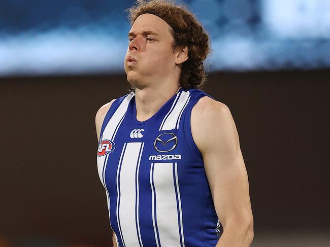 AFL Round 10. Geelong vs North Melbourne at the Gabba, Brisbane.  05/08/2020.  Ben Brown of the Kangaroos with his left knee iced walks back to the change rooms at half time  . Pic: Michael Klein