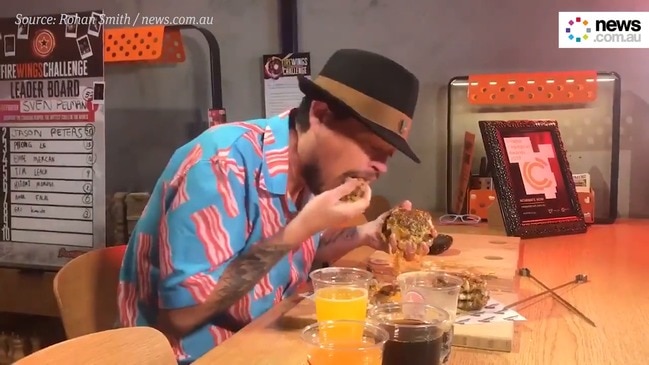 Australia’s #1 eater smashes a 23 patty burger