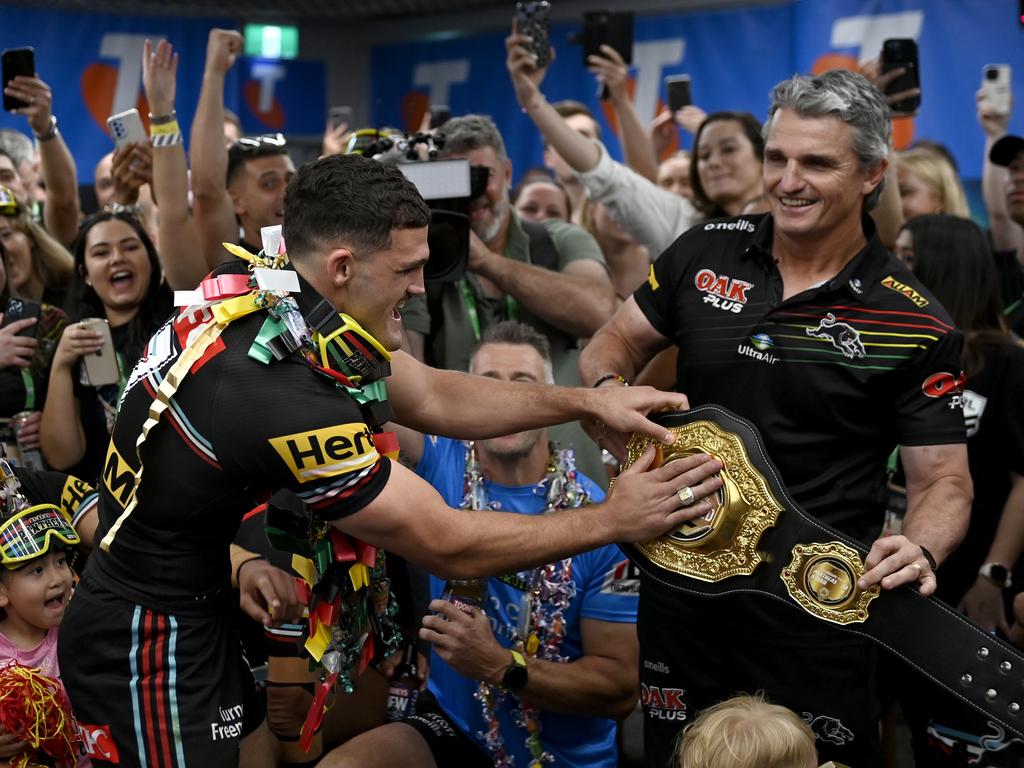 Penrith coach Ivan Cleary is presented with the belt by son Nathan. Picture: NRL Photos