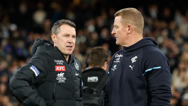 MELBOURNE, AUSTRALIA - MAY 03: Craig McRae, Senior Coach of the Magpies and Michael Voss, Senior Coach of the Blues are seen after the 2024 AFL Round 08 match between the Carlton Blues and the Collingwood Magpies at The Melbourne Cricket Ground on May 03, 2024 in Melbourne, Australia. (Photo by Dylan Burns/AFL Photos via Getty Images)