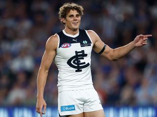 MELBOURNE, AUSTRALIA - MARCH 29: Charlie Curnow of the Blues celebrates a goal during the 2024 AFL Round 03 match between the North Melbourne Kangaroos and the Carlton Blues at Marvel Stadium on March 29, 2024 in Melbourne, Australia. (Photo by Michael Willson/AFL Photos via Getty Images)