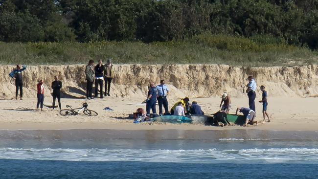 A man has died after being bitten by a shark at Tuncurry Beach on the Mid-North Coast.