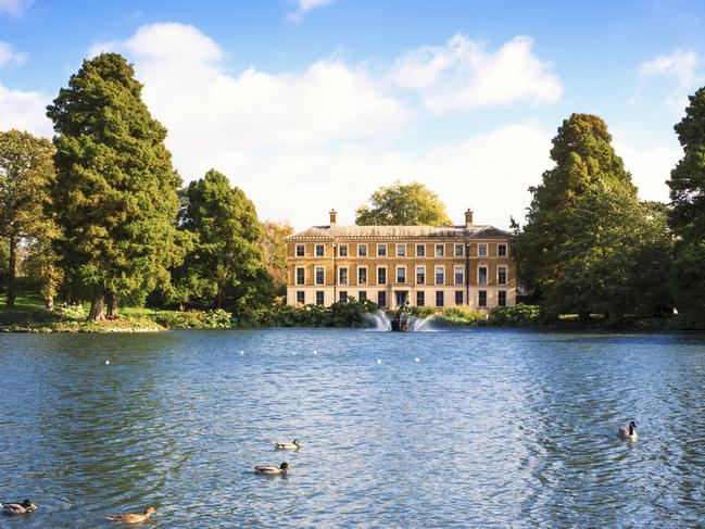 London, United Kingdom - October 27, 2013: Pond with ducks and Museum No 1 in the Royal Botanic Gardens (Kew Gardens, London, UK).