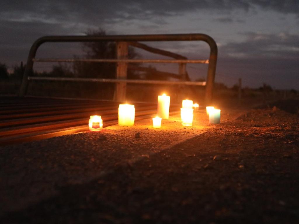 Residents lit candles in memory of Mr Turner. Picture: Steve Vit