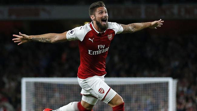 Arsenal's French striker Olivier Giroud celebrates scoring Arsenal's fourth goal.