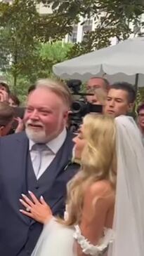 Kyle Sandilands and his son Otta arrive at wedding