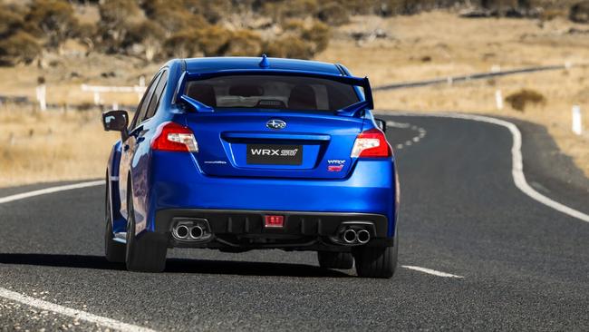 STI: Stable, grippy but ready for dirt road shenanigans.