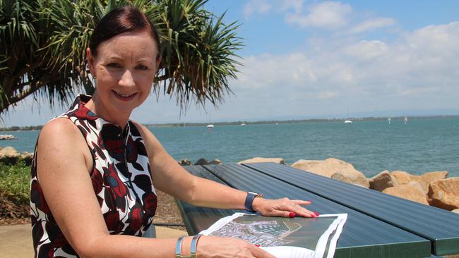 State Labor MP for Redcliffe Yvette D'Ath examines the map for the barge to Moreton Island landing site. Photo Erin Smith.