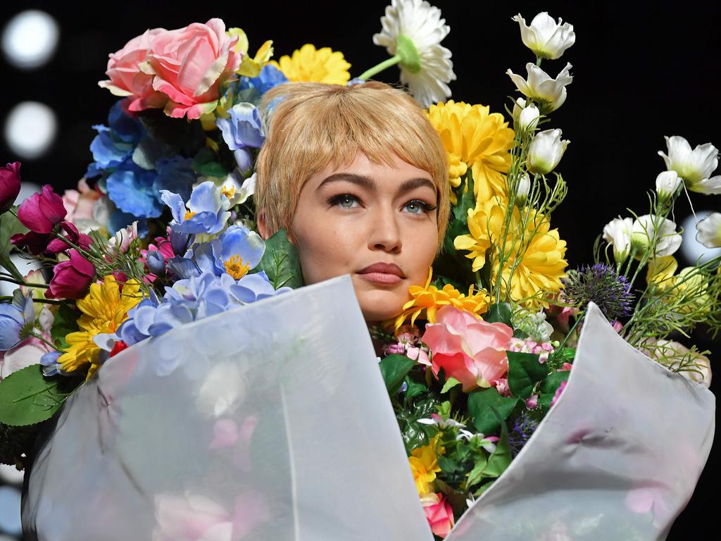 Model Gigi Hadid presents a creation for fashion house Moschino during the Women’s Spring/Summer 2018 fashion shows in Milan, on September 21, 2017. Picture: AFP