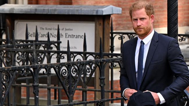 (FILES) Britain's Prince Harry, Duke of Sussex leaves from the Royal Courts of Justice, Britain's High Court, in central London on March 27, 2023. Lawyers for Prince Harry on December 5 began a legal challenge over his security arrangements in the UK, after he quit frontline royal duties and moved to North America.  The case about his loss of UK taxpayer-funded protection is the latest in a string of court proceedings initiated by Harry, whose father is King Charles III. (Photo by JUSTIN TALLIS / AFP)