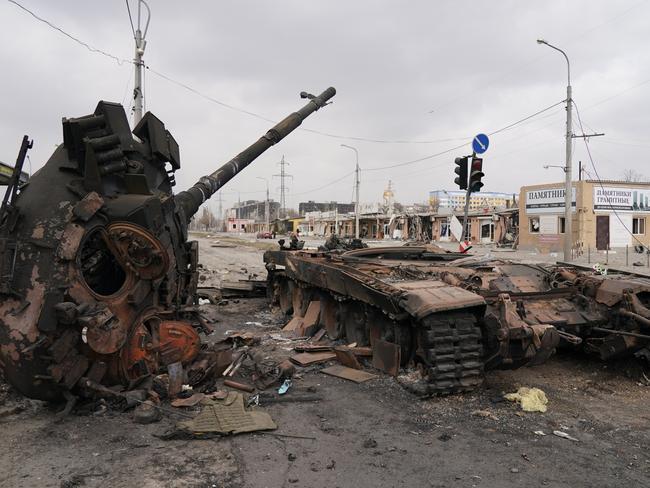 A wrecked tank is seen as civilians are being evacuated along humanitarian corridors from the Ukrainian city of Mariupol under the control of Russian military and pro-Russian separatists. Picture: Getty Images