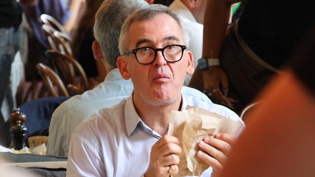 Brad Banducci tucks into lunch at a Surry Hills cafe. Picture: Michael Bilbe-Taylor