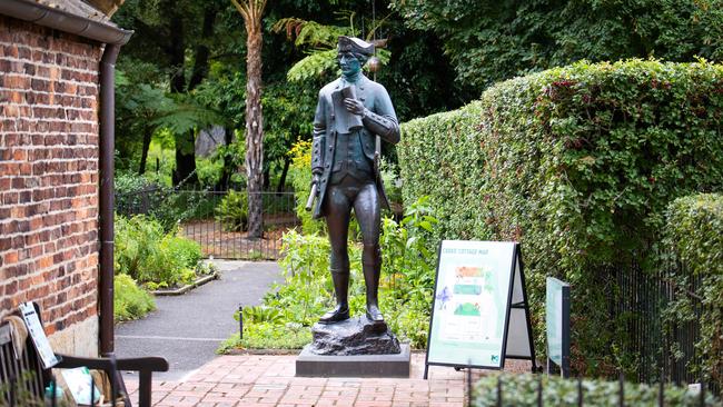 MELBOURNE, FEBRUARY 13, 2025: A statue of Captain Cook has been returned to its plinth beside Cooks Cottage in Melbournes Fitzroy Gardens after being hacked off in February 2024: Picture: Mark Stewart