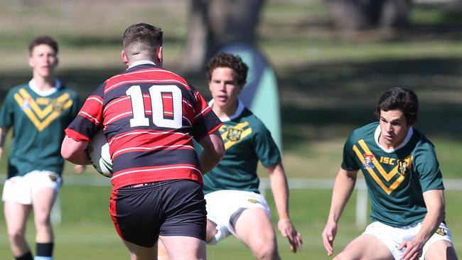 Prop Hugh Thomas charges into the Farrer defence. Picture by Peter Lorimer.