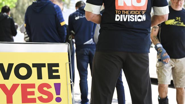 CANBERRA, AUSTRALIA - OCTOBER 13: "Vote No" volunteers at a polling centre on October 13, 2023 in Canberra, Australia. A referendum for Australians to decide on an indigenous voice to parliament will be held on October 14, 2023 and compels all Australians to vote by law. Early voting began on Oct. 2, with voting getting underway in all states. (Photo by Martin Ollman/Getty Images)