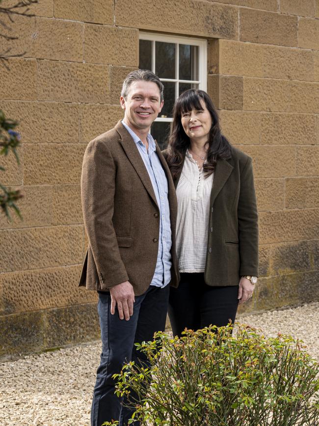 Homeowners Stu and Karen Miles outside their renovated home in Oatlands, Tasmania. Picture: Brad Harris