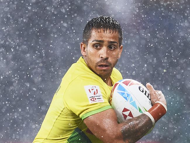 SYDNEY, AUSTRALIA - FEBRUARY 02: Maurice Longbottom of Australia is tackled during the 2020 Sydney Sevens match between New Zealand and Australia at Bankwest Stadium on February 02, 2020 in Sydney, Australia. (Photo by Brett Hemmings/Getty Images)