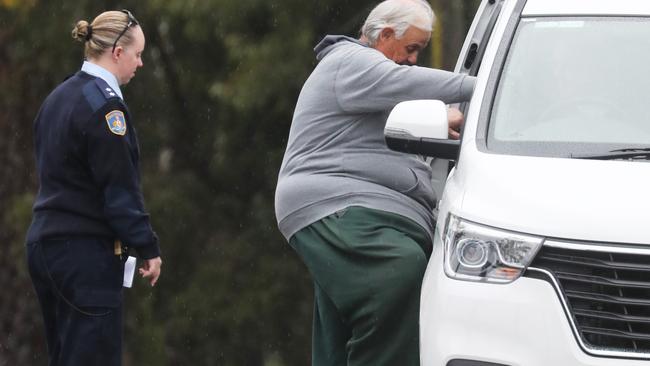 Rees appeared to struggle to get into the white van. Picture: John Grainger