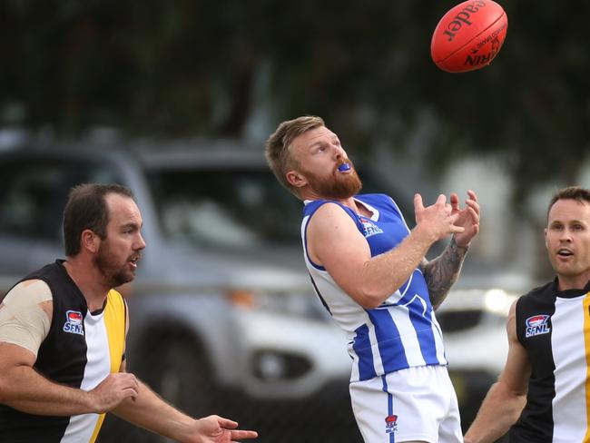 SFL (Div 3): Ashwood v Moorabbin.35 Shaun Jackson captain for Moorabbin attempts to mark the ball.Picture: Stuart Milligan