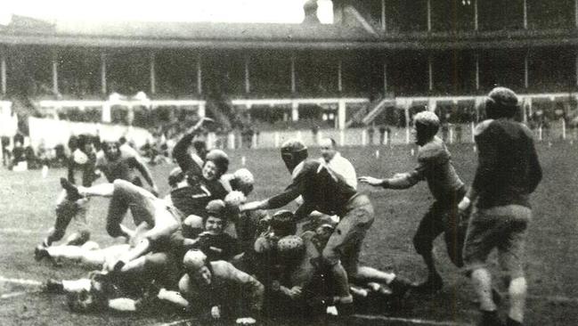 American GIs and Australian soldiers enjoy a friendly game of gridiron at the Melbourne Cricket Ground. during World War II.