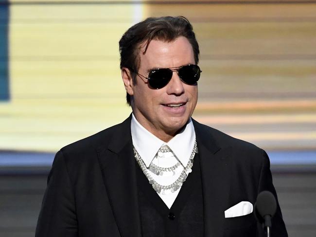 Actor John Travolta speaks on stage during the Grammy Awards. Picture: Kevin Winter/Getty Images for NARAS