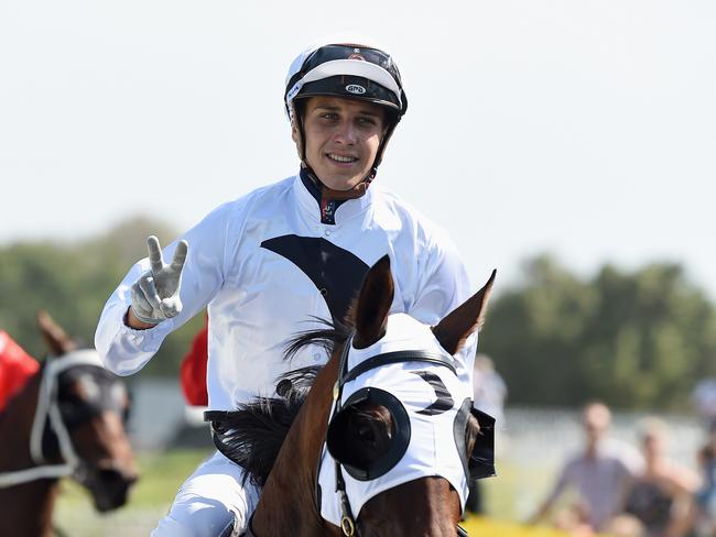 Gold Coast race meeting at Bundall.  Race 4 winner No4 Calabria ridden by Jag Guthmann- Chester. Picture: Lawrence Pinder