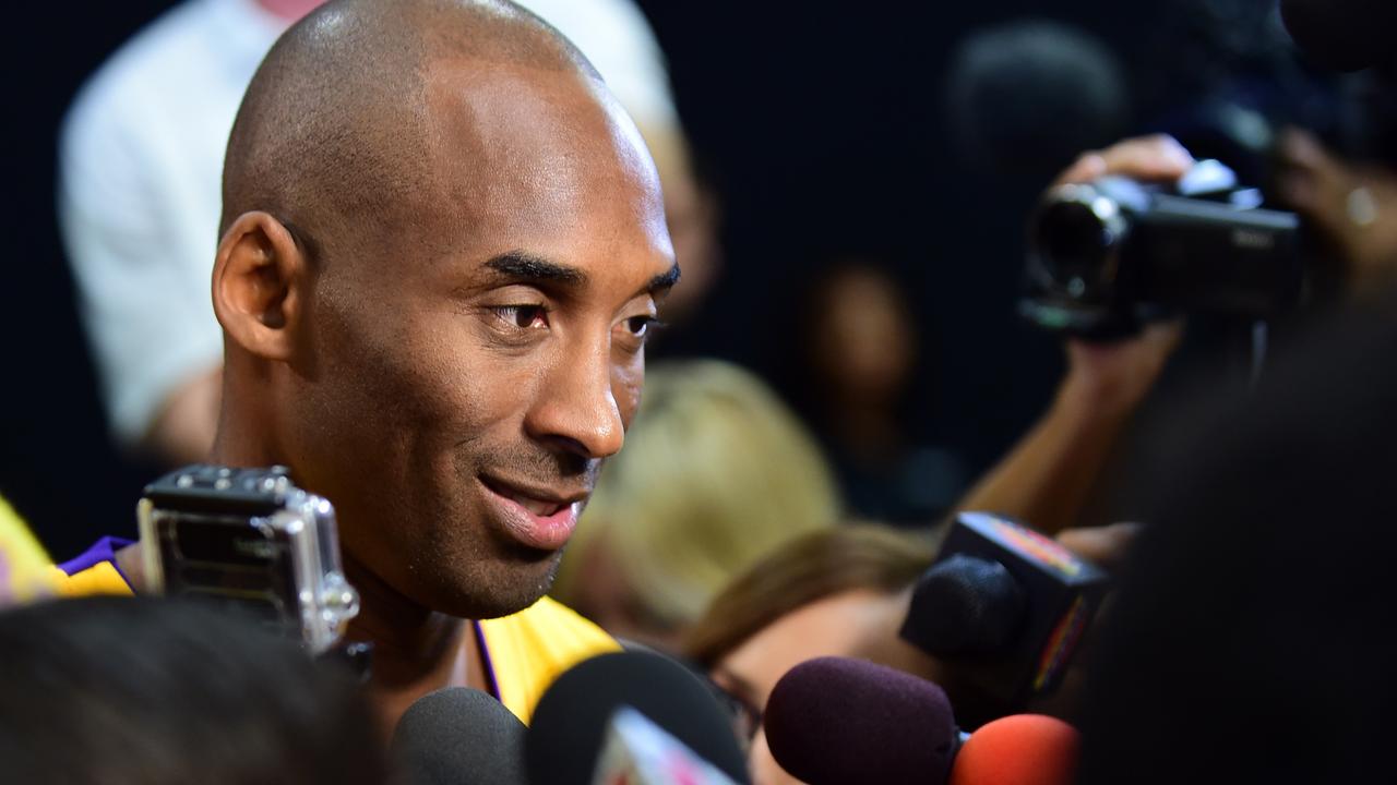 TO GO WITH AFP STORY by Rob WOOLLARD, Basket-NBA-Lakers-Bryant (FILES) Kobe Bryant of the Los Angeles Lakers meets the press during interviews at the Los Angeles Lakers media day in this September 28, 2015, file photo in El Segundo, California. After a glittering career spanning three decades, the final curtain is slowly coming down on Kobe Bryant -- but few are expecting a Hollywood ending for the Los Angeles Lakers superstar. AFP PHOTO / FREDERIC J. BROWN/FILES