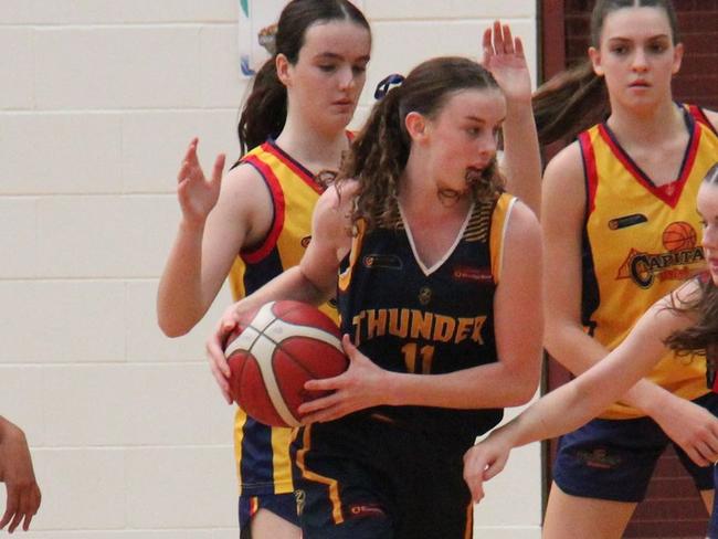 Logan Thunder's Sharni Reisinger in action against the Brisbane Capitals.