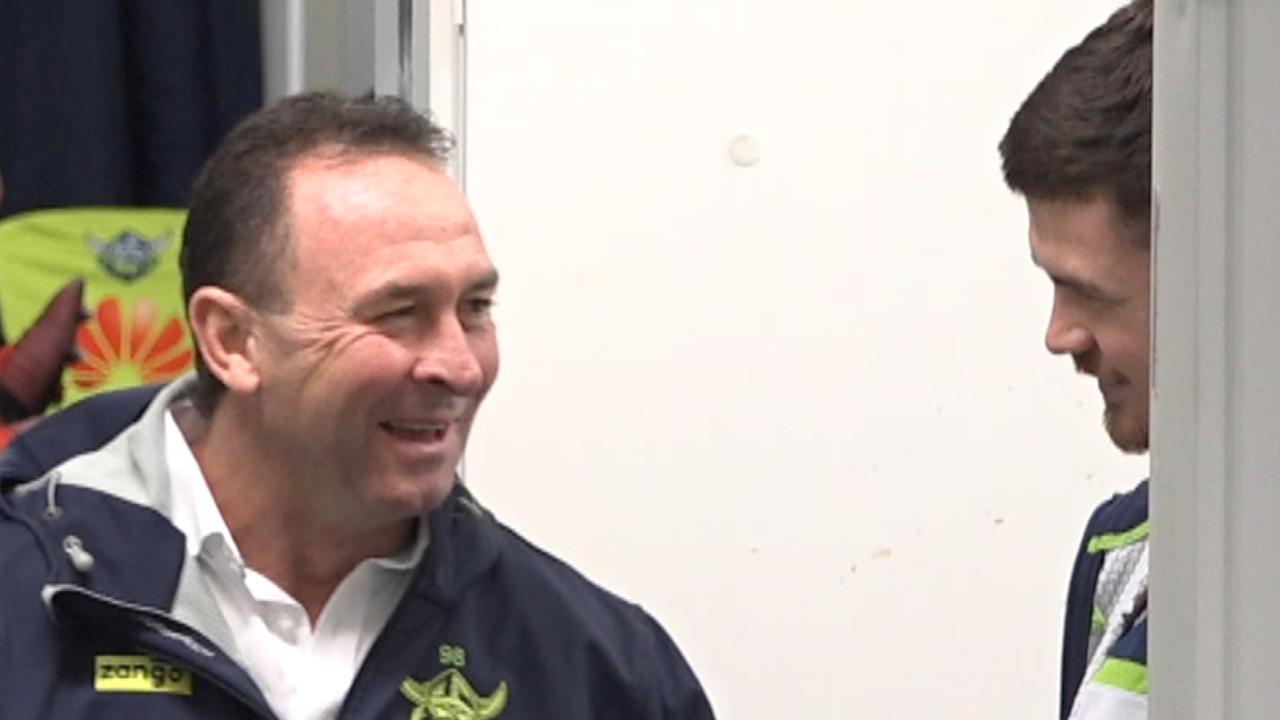 Ricky Stuart and John Bateman share a laugh in the sheds.